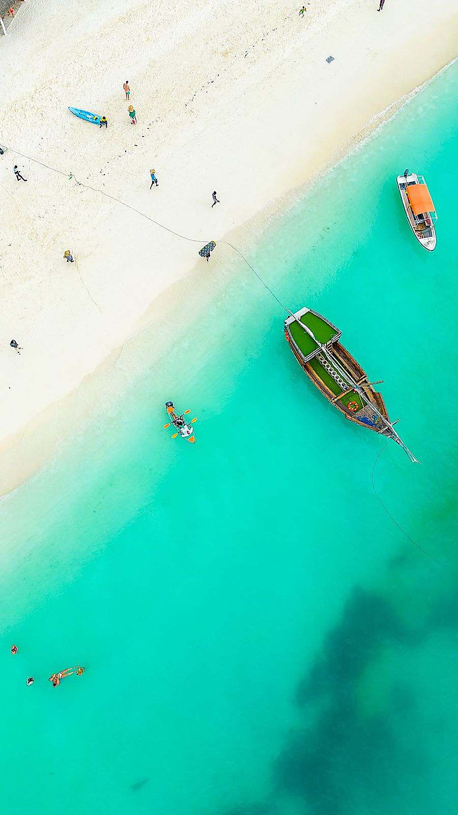 Golden light over a turquoise lagoon in Zanzibar